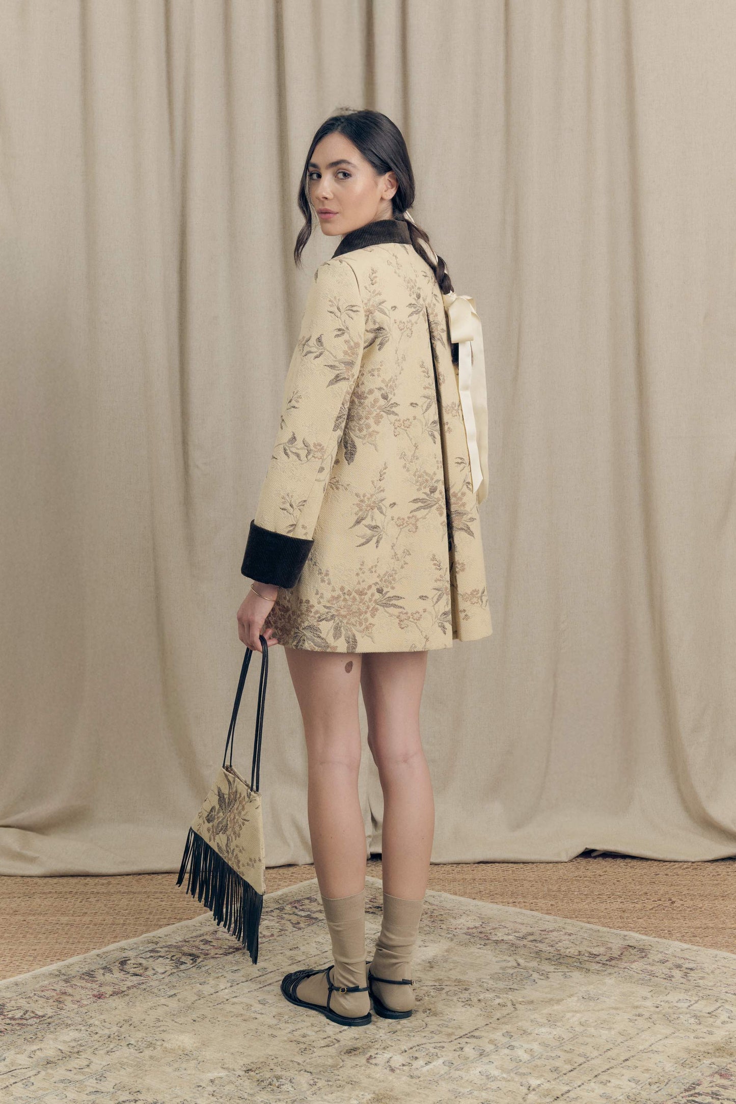 Botteghe Oscure one-of-a-kind field jacket in vintage tapestry fabric, back view with botanical pattern and velvet collar and cuffs