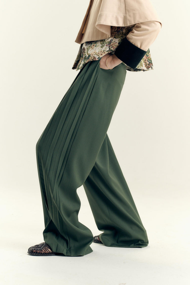 Tailored virgin wool trousers with flare cut and pleated side by Botteghe Oscure