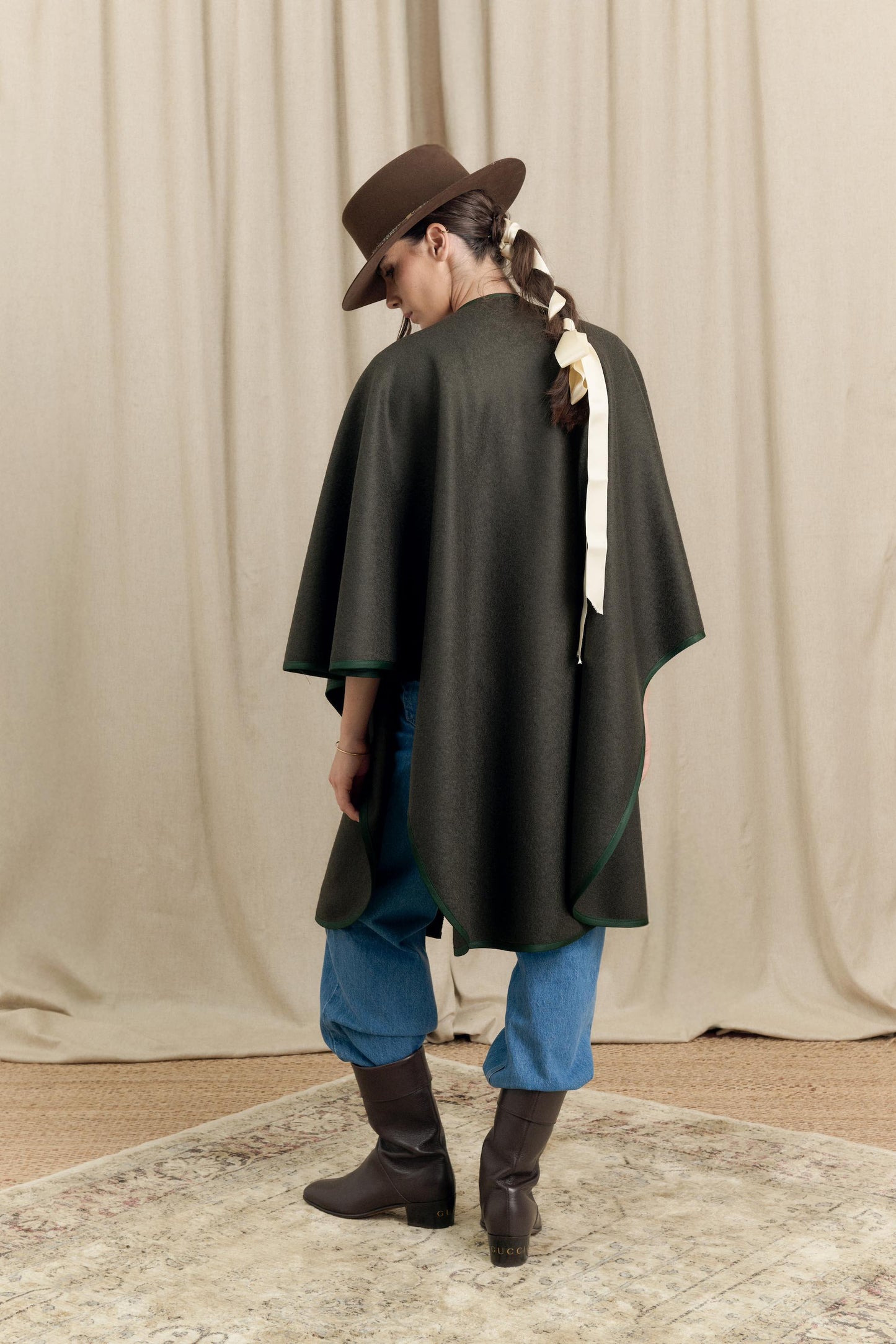 Back view of Botteghe Oscure Loden Cape showing fluid silhouette