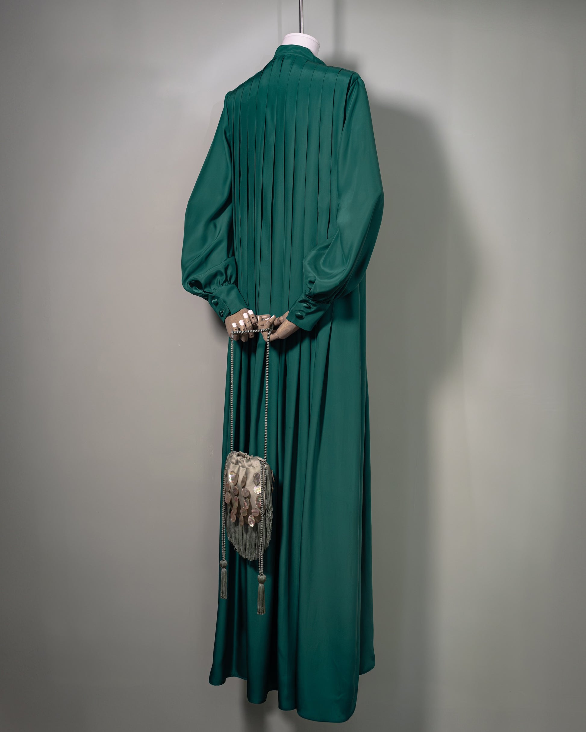 Botteghe Oscure green long pleated silk dress in 100% silk satin, side back view.