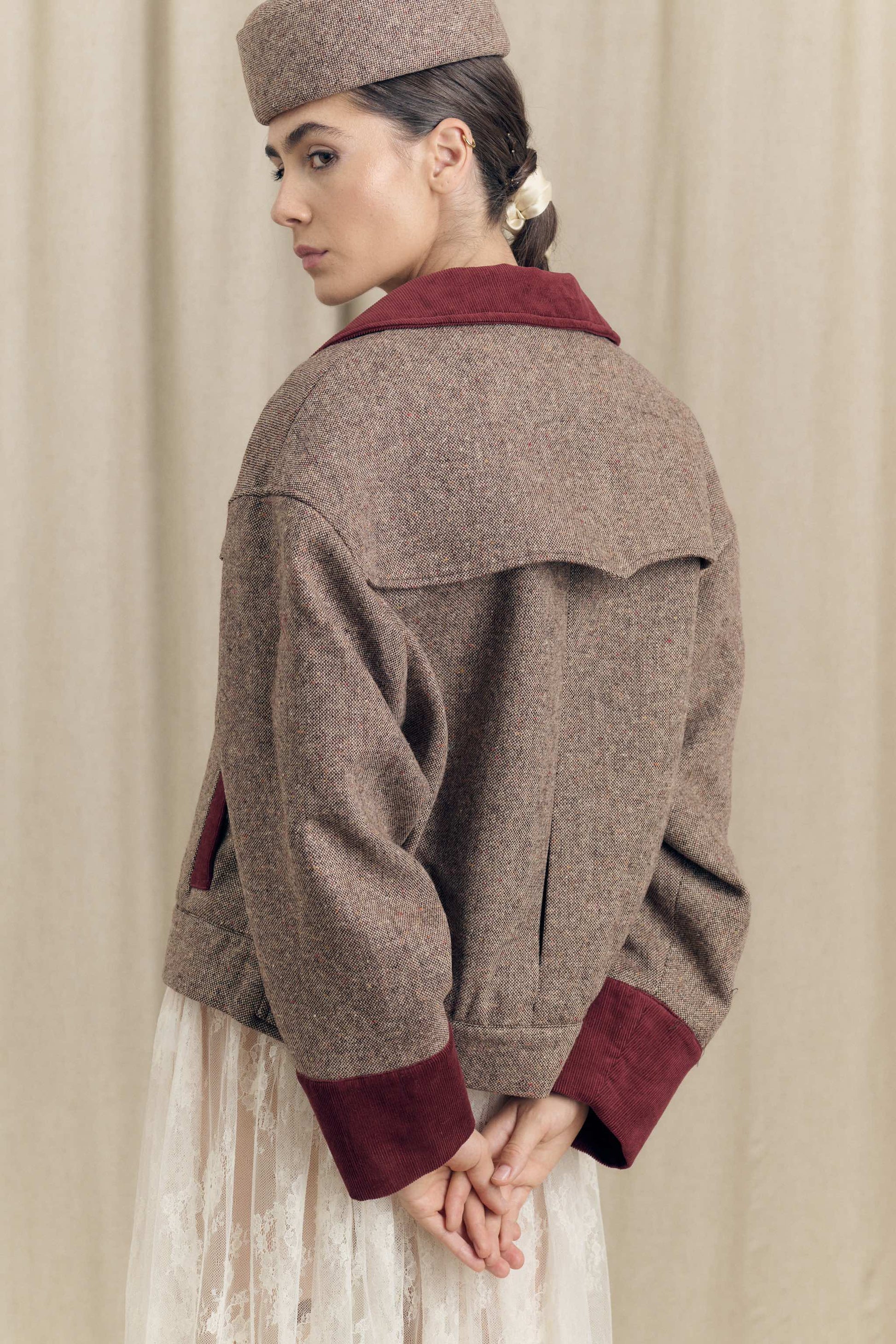 Oversized tweed bomber jacket back view with wind flap detail Botteghe Oscure
