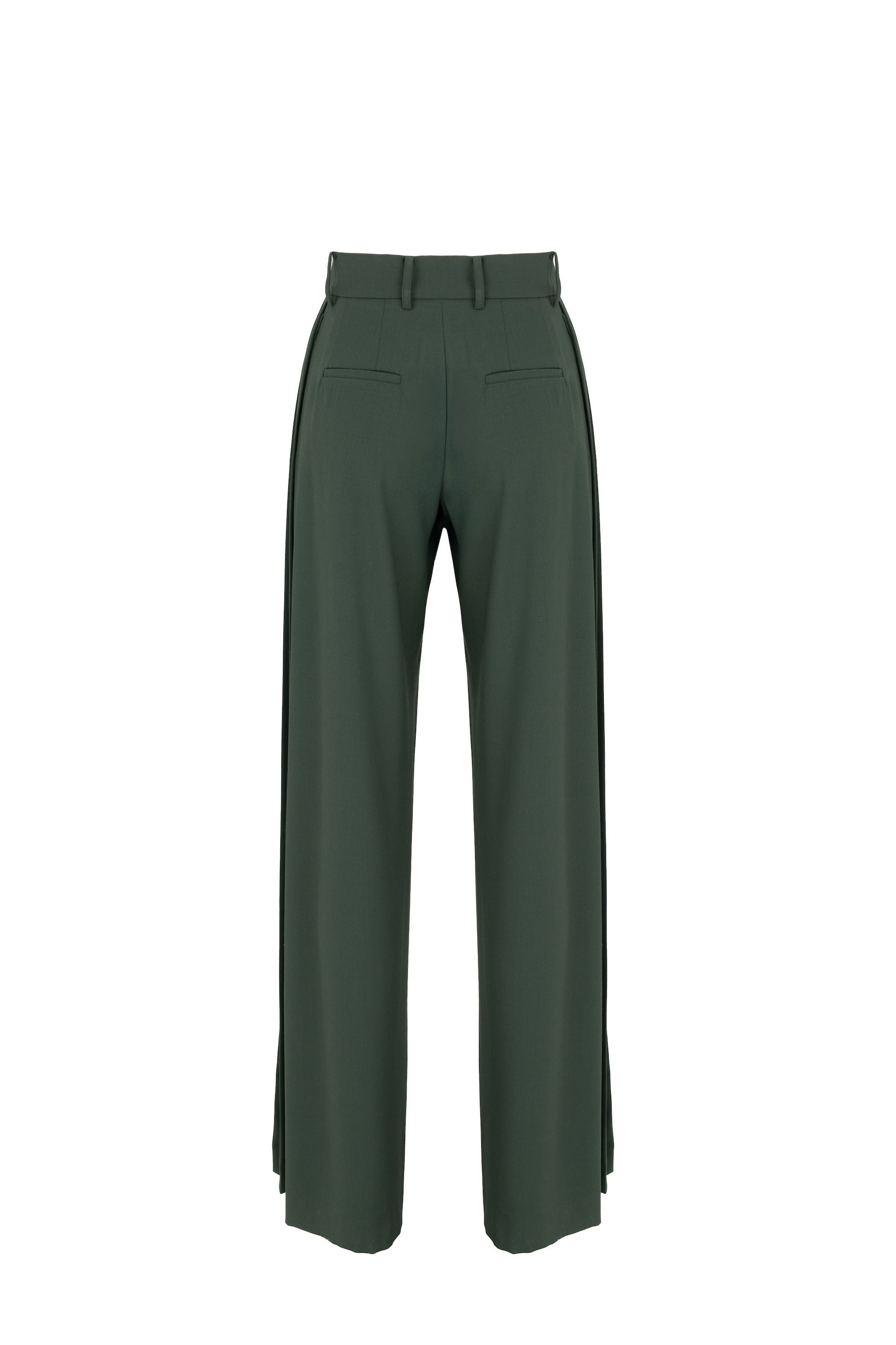 Side view of tailored flare trousers in virgin wool with deep side pleats and high waist. Soft structure and elegant movement. Botteghe Oscure, Made in Italy.