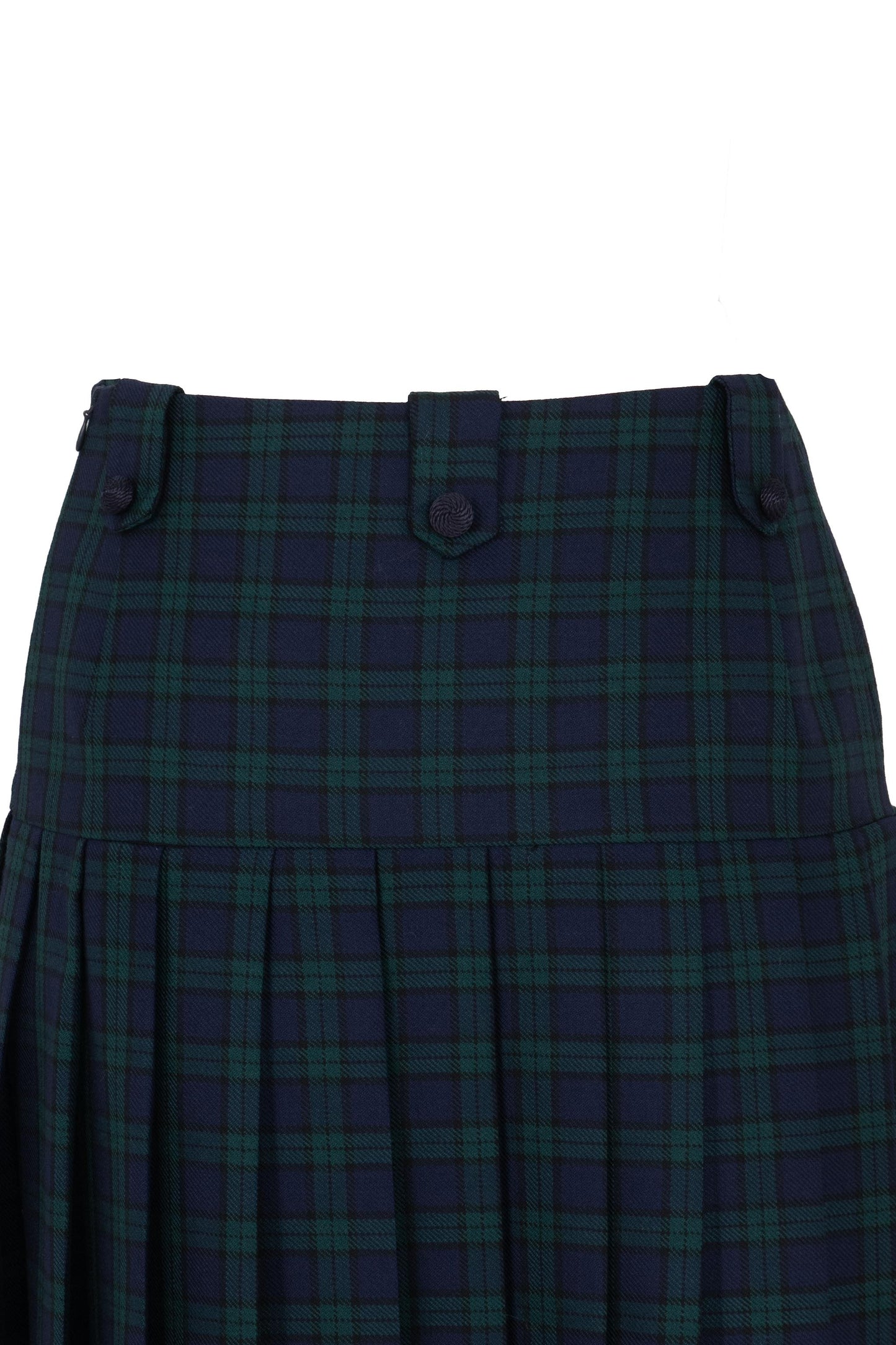 Close-up of the Botteghe Oscure Black Watch pleated skirt showing viscose passementerie buttons and fine wool fabric texture.