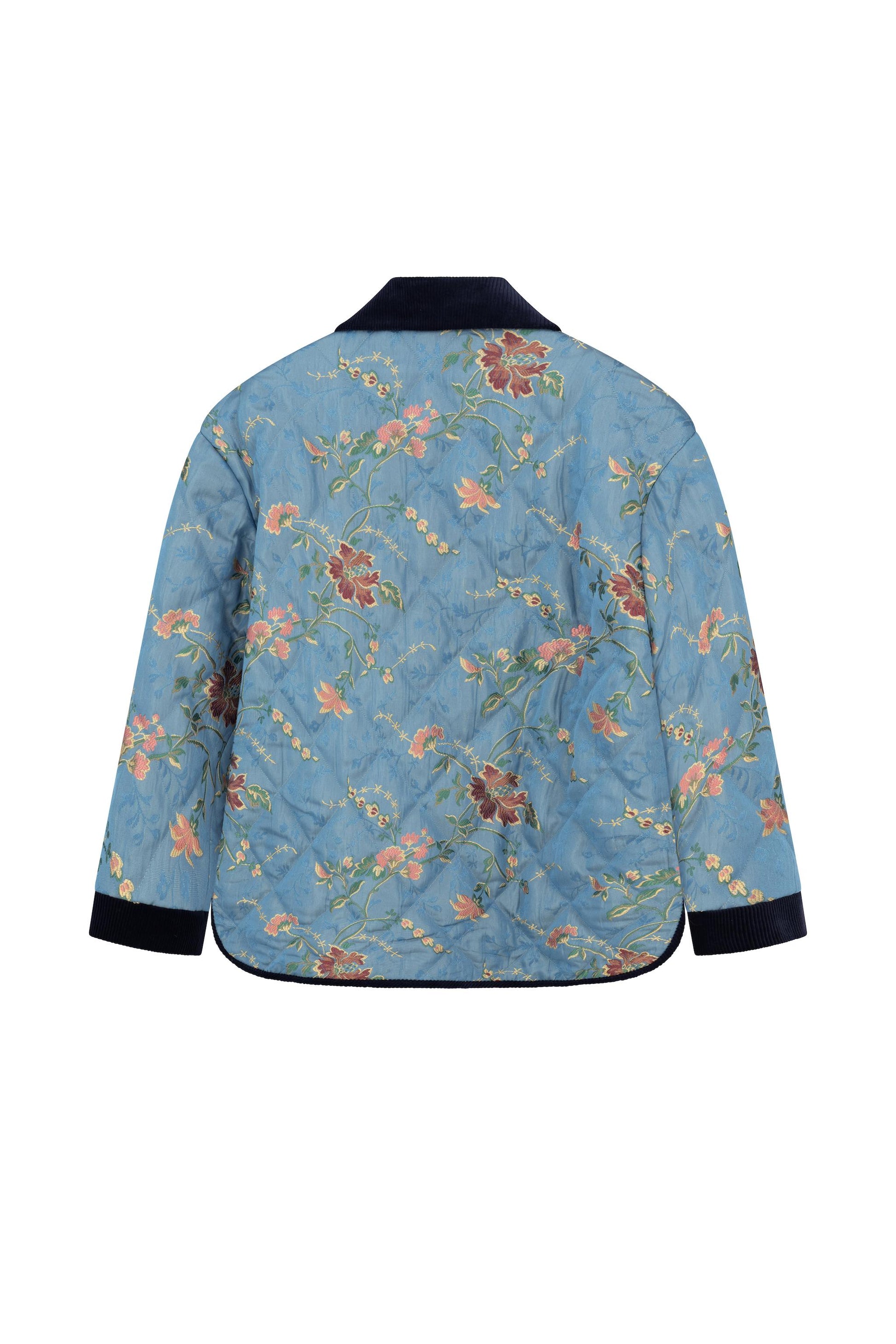 Back view of the Botteghe Oscure quilted jacket featuring a blue floral lampas pattern inspired by antique chinoiseries.