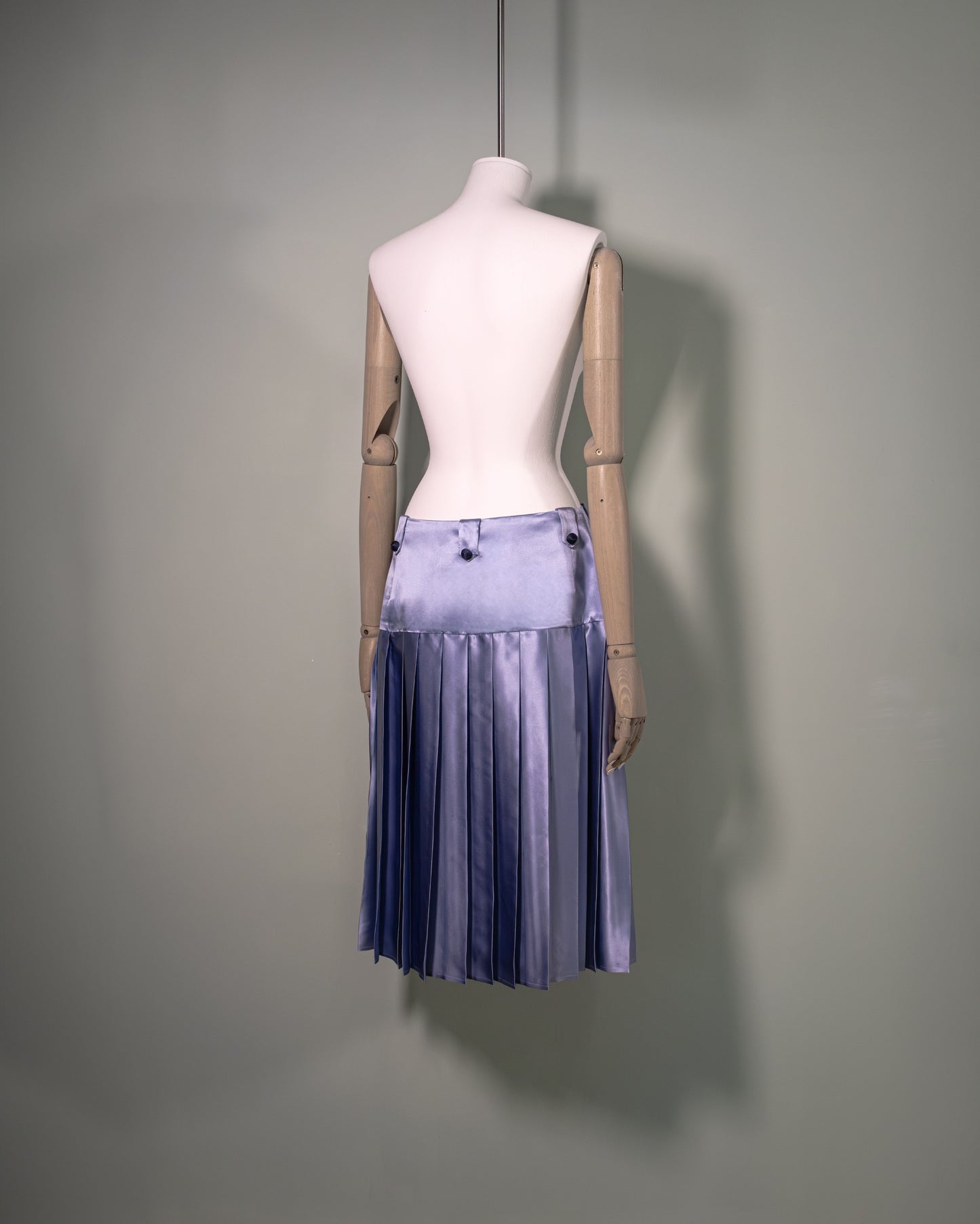 Botteghe Oscure pleated silk satin skirt in powder blue and passementerie buttons, back.  Made in Italy