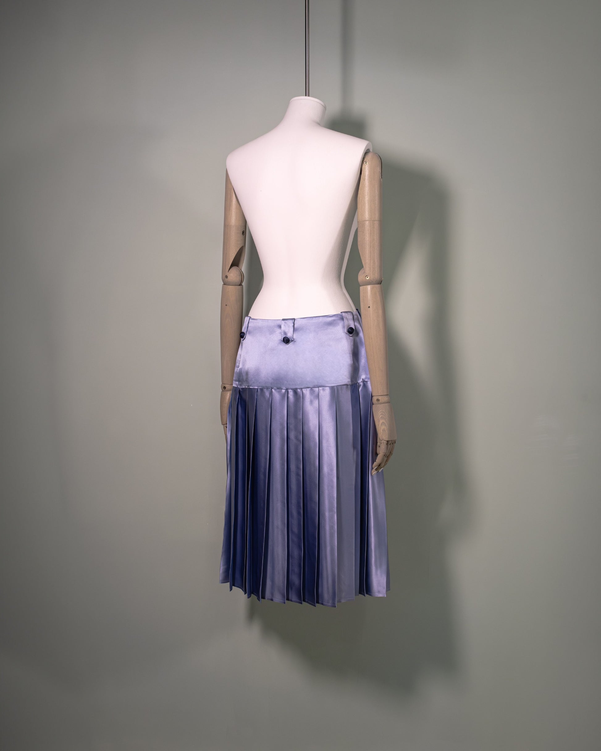 Botteghe Oscure pleated silk satin skirt in powder blue and passementerie buttons, back.  Made in Italy
