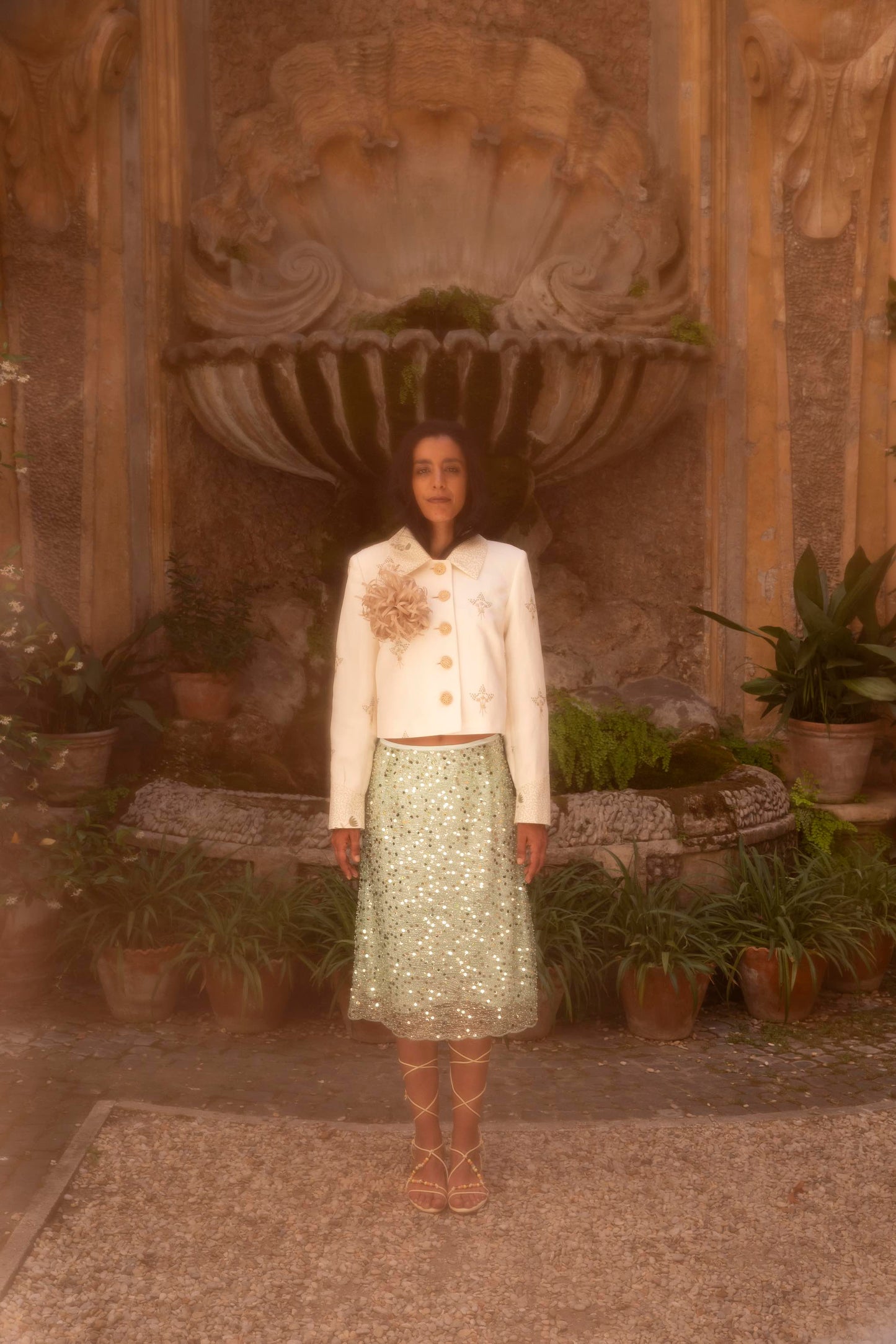 Botteghe Oscure Carré Jacket in archival English linen with hand-embroidered floral bouquets, styled in a complete editorial look.