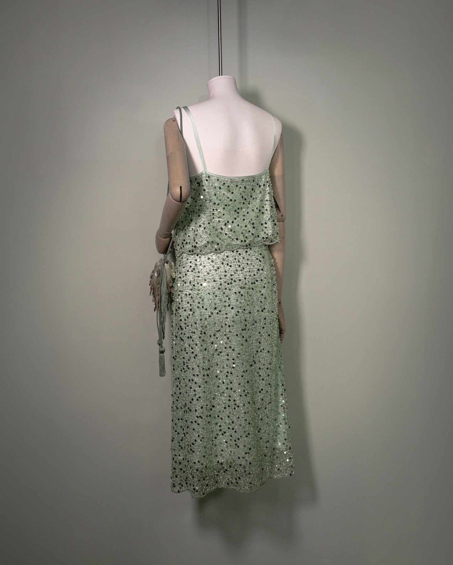 Botteghe Oscure embroidered silk top styled in a complete embellished evening look back view.