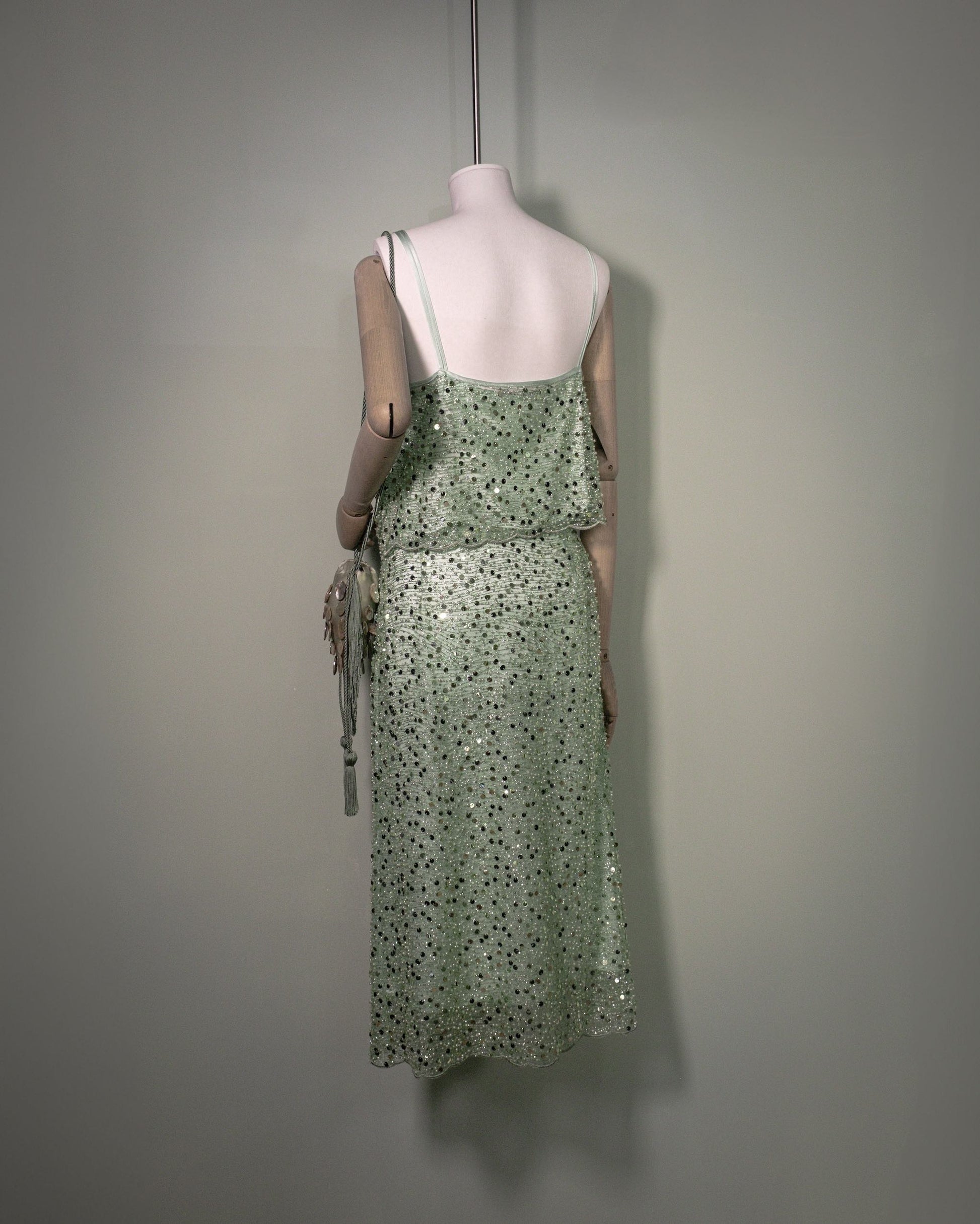 Botteghe Oscure embroidered silk top styled in a complete embellished evening look back view.