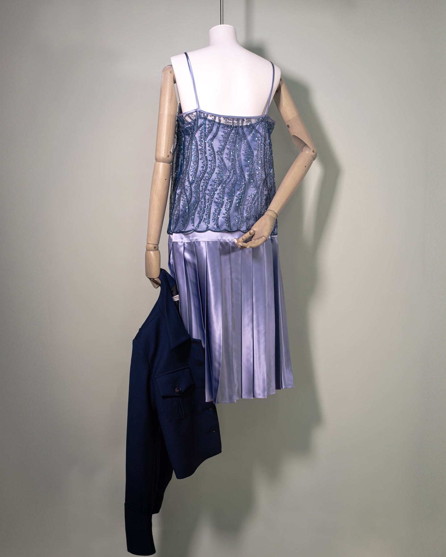 Botteghe Oscure embroidered top styled with Academia pleated silk satin powder blue skirt. Back.