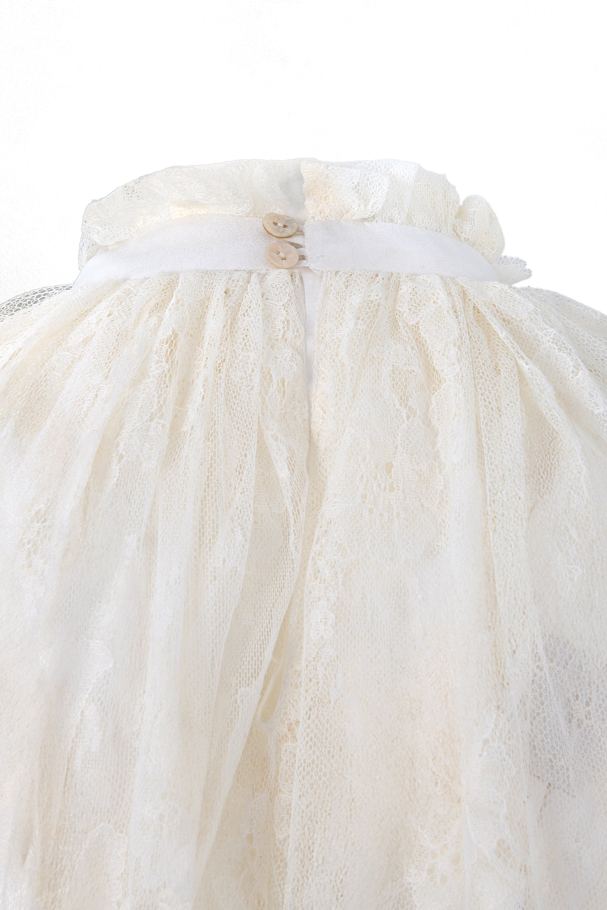 Botteghe Oscure dress in French Chantilly lace with draped lace capelet and silk details 