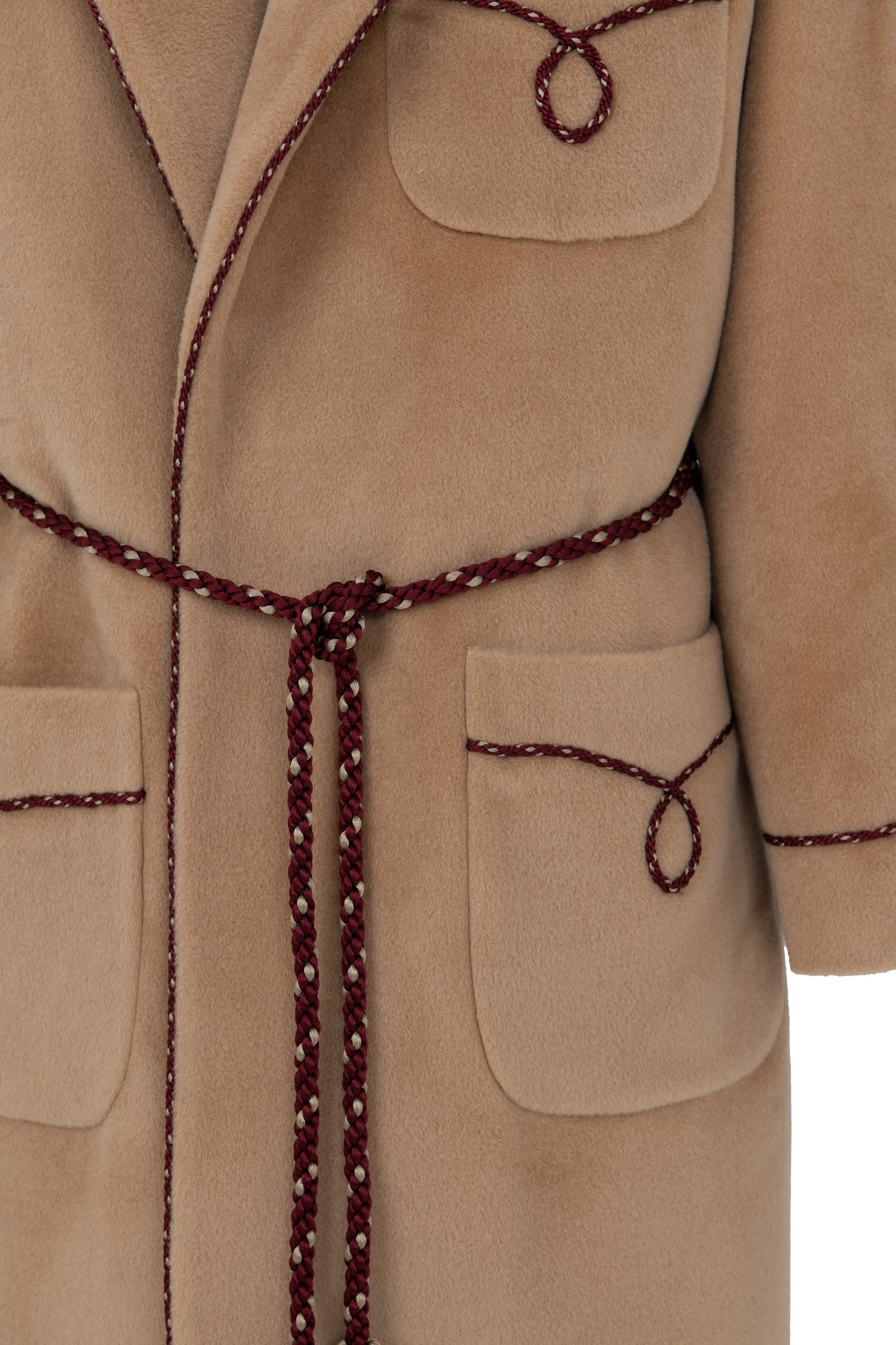 Detail of bi-colour twisted cord decoration on camel combed wool wrap coat, Botteghe Oscure.
