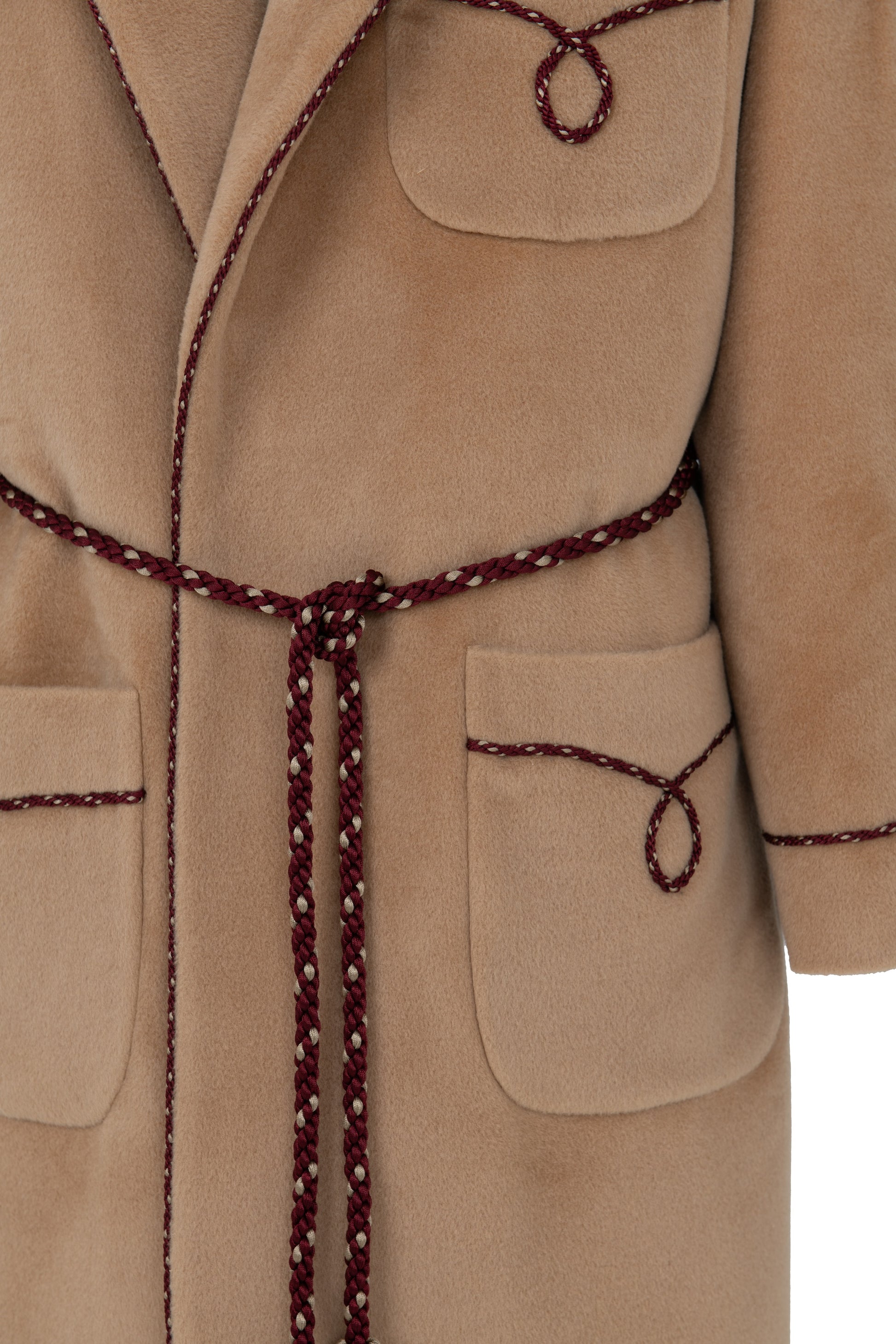 Detail of bi-colour twisted cord decoration on camel combed wool wrap coat, Botteghe Oscure.