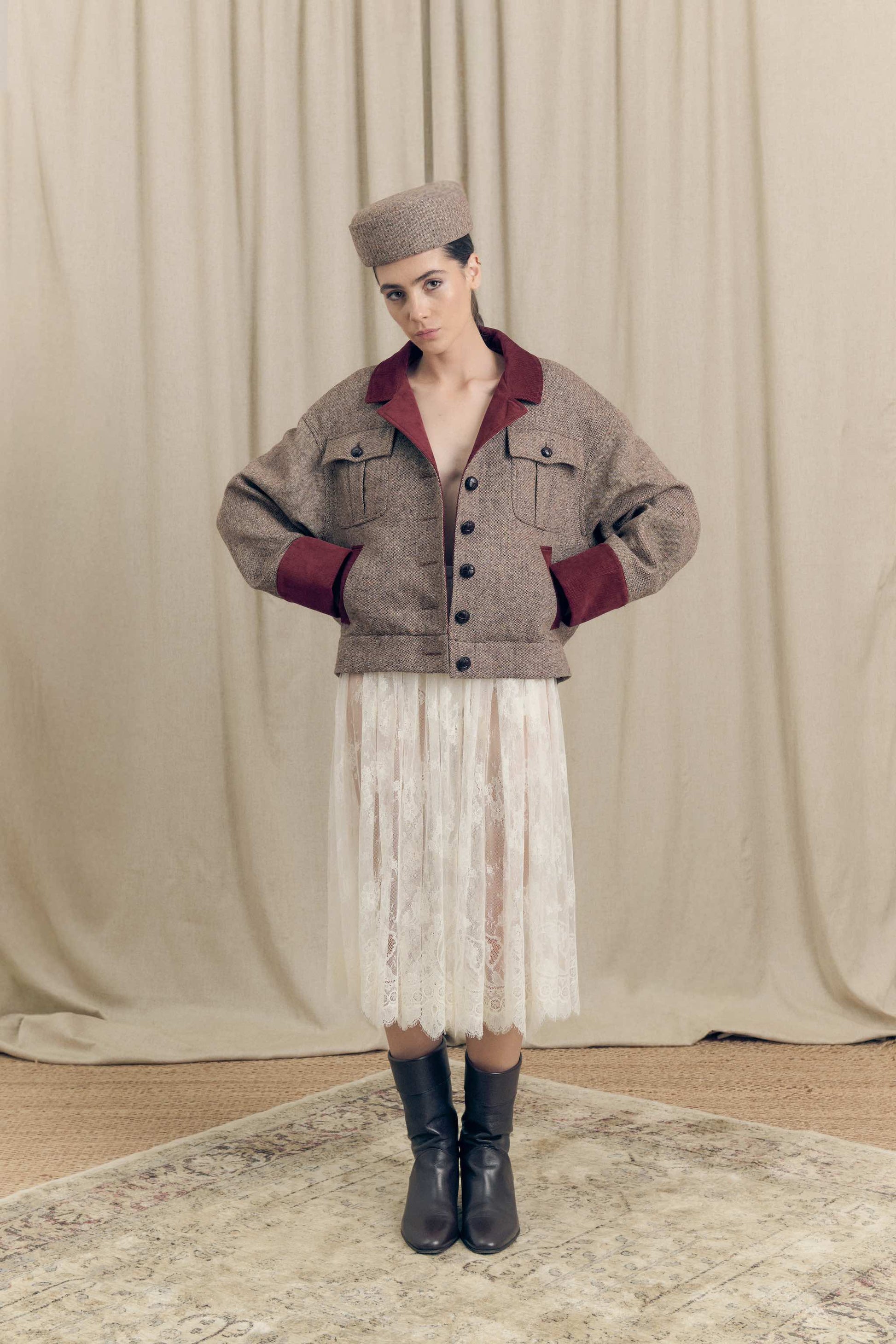 model wearing tweed oversized bobmber with velvet details and french chantilly lace skirt with silk petticoat by Botteghe Oscure