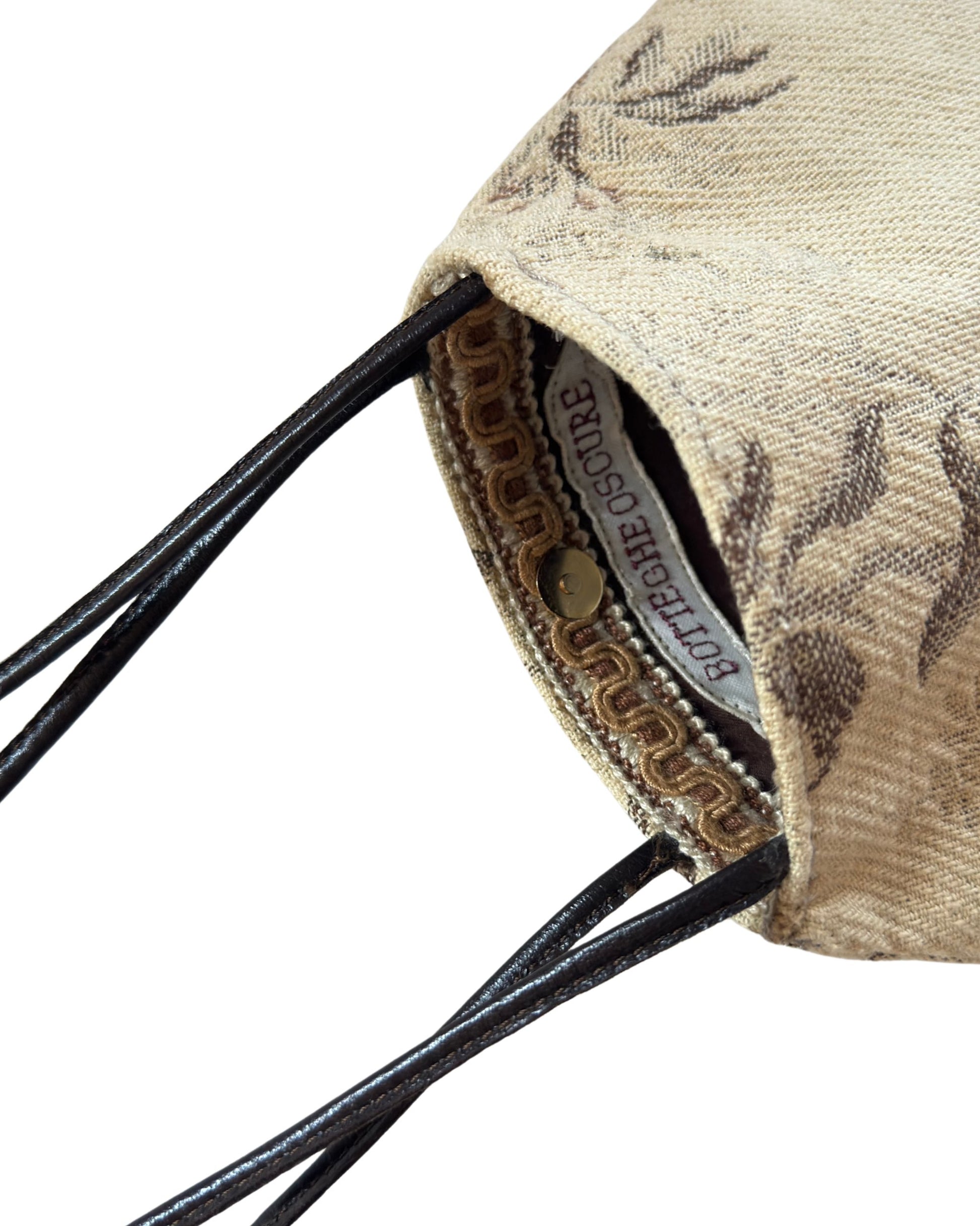 Hand and shoulder bag by Botteghe Oscure, handmade,  in floral vintage jacquard fabric with black nappa leather fringes.
