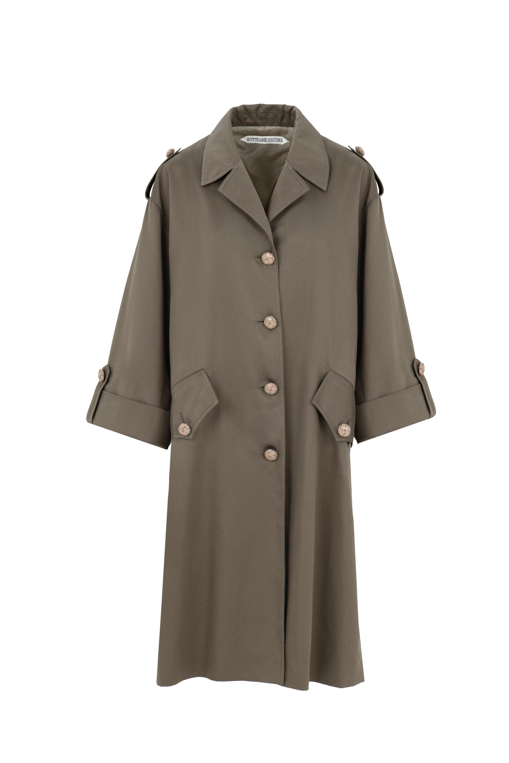 Front view of oversize cotton parka with braided leather buttons and pleated back panel – Botteghe Oscure