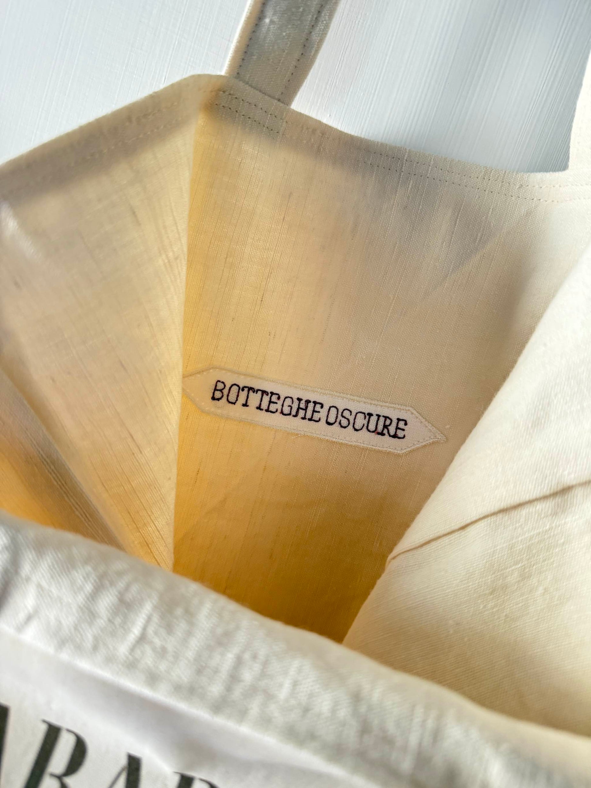 Interior view of Paradeisos tote bag in linen with Botteghe Oscure label by Botteghe Oscure