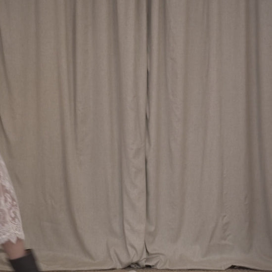 video of model wearing tweed oversized bomber jacket with velvet details and french chantilly midi skirt with silk petticoat by Botteghe Oscure