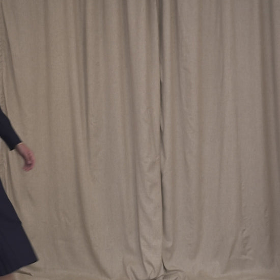Botteghe Oscure look 19 tailored wool set in motion, Carré jacket and Plissé Dos skirt.