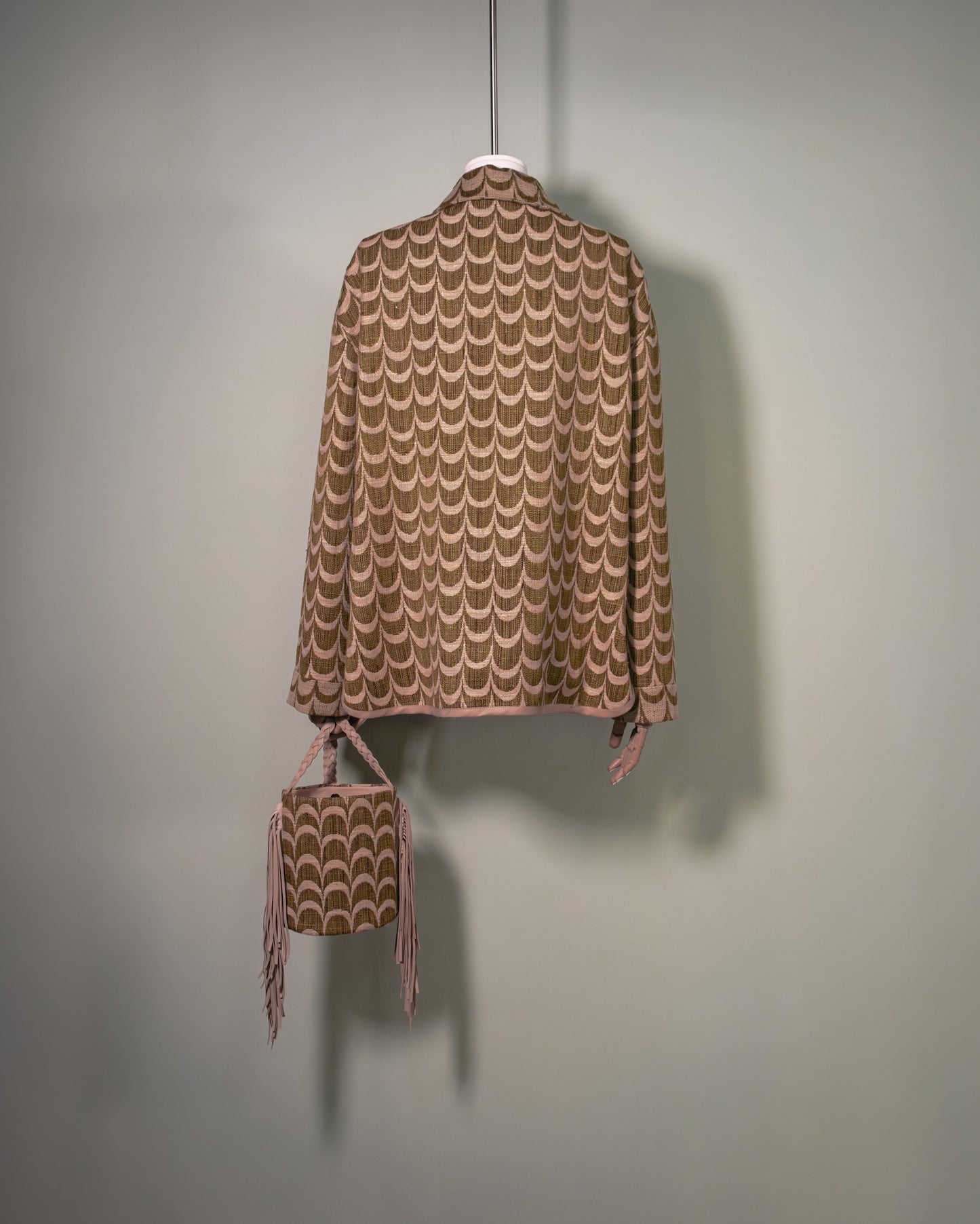 One of a kind Botteghe Oscure workwear jacket In archival Palmette linen fabric, back view.